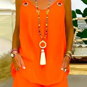 Two piece short set outfit.